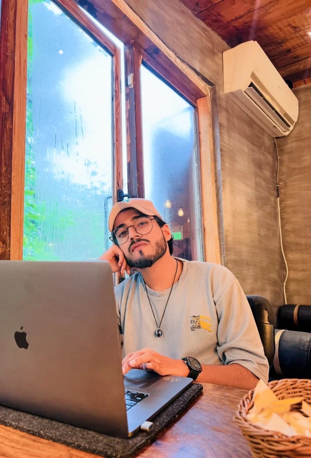 Haseeb Ali working on a laptop